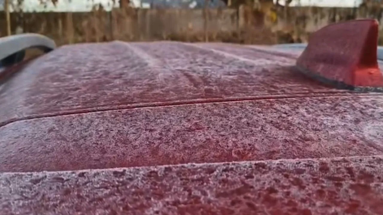 Car covered in frost in Koida