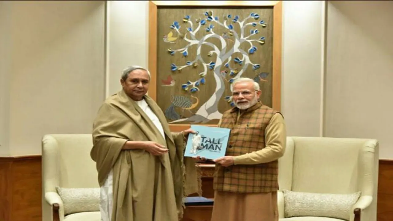 CM Naveen meets PM Modi, gifts book on Biju Babu