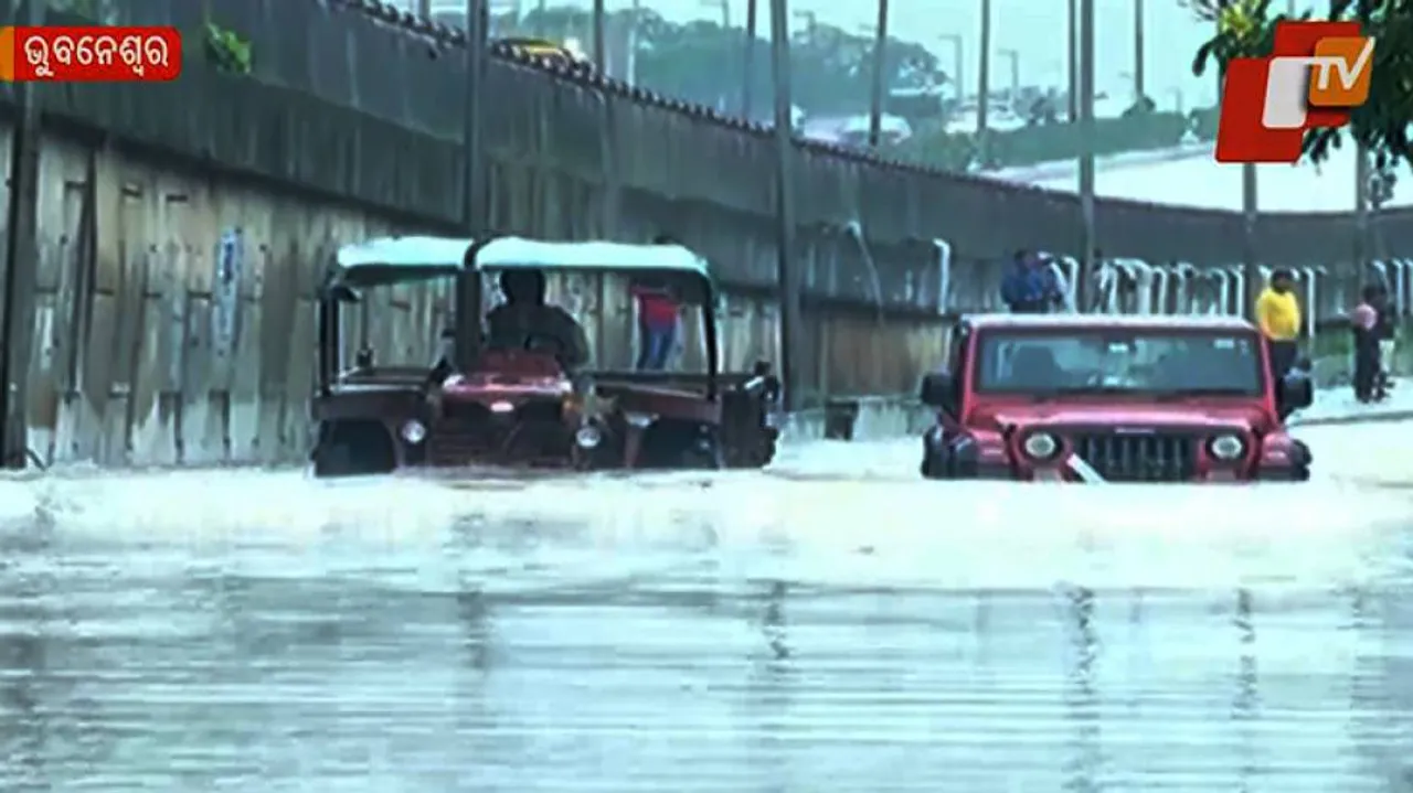 Tractor, car submerge as heavy rain leaves bhubaneswar flooded