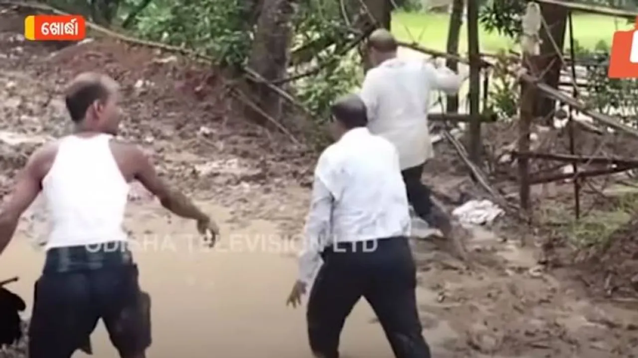 Angry Villagers In Odisha Make Two Govt Officials Walk On Muddy Road, Video Goes Viral