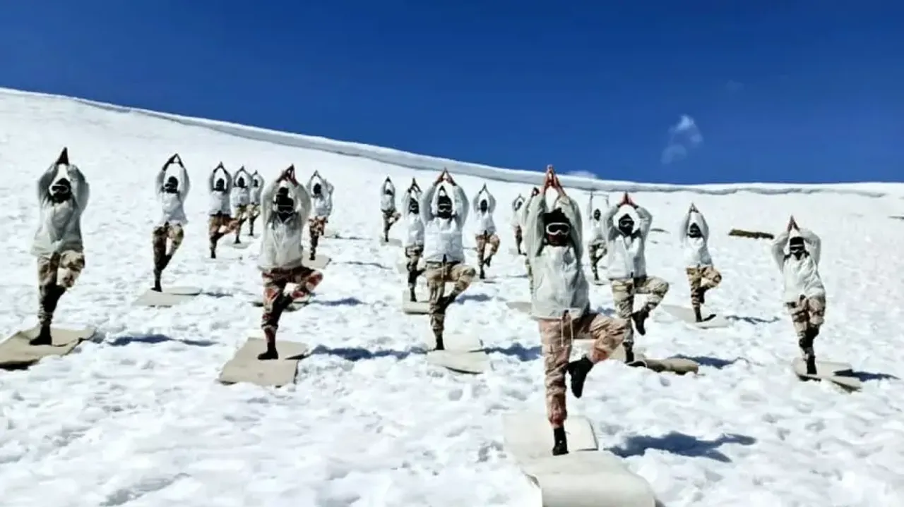 ITBP personnel perform yoga at 15,000 feet in snow-capped Himalayas