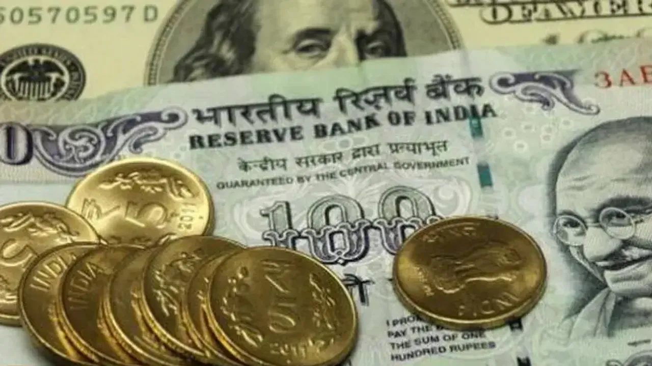Rupee hits new low, falls 14 paise to 77.69 per US dollar