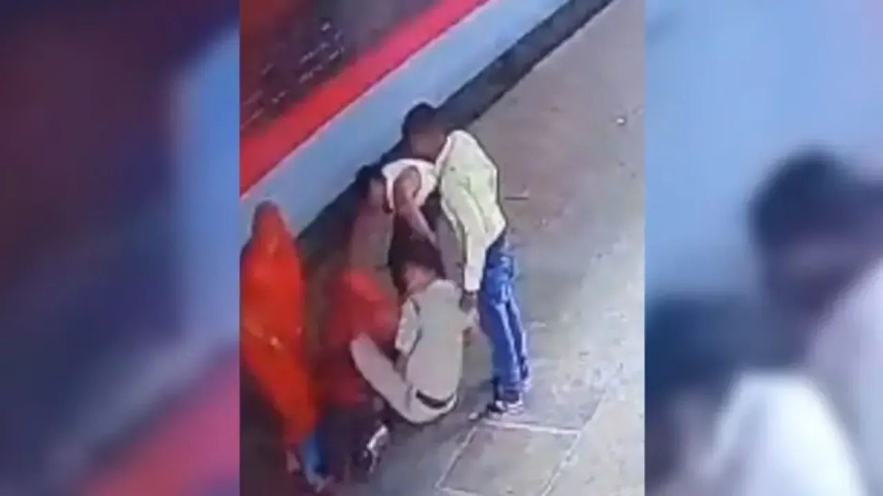 Watch: RPF man saving woman from being run over by train