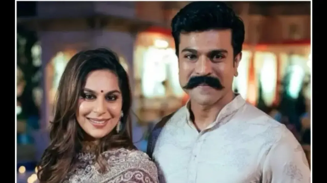 Ram Charan with his wife