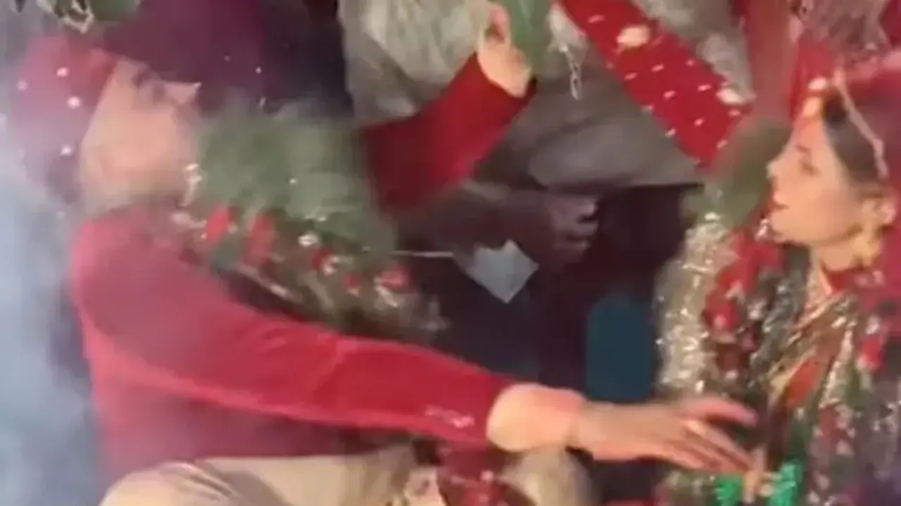 Screenshot of the fight between the bride and the groom