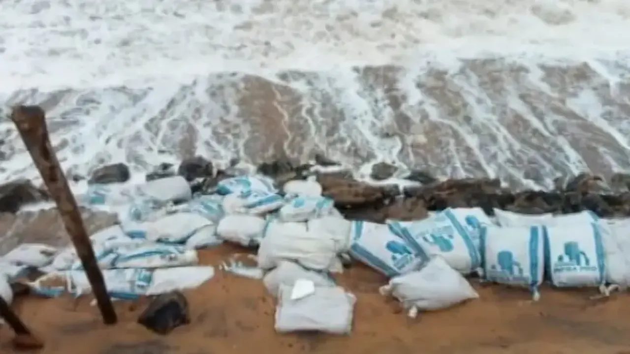 Guard wall on Puri-Konark Marine Drive Road washed away 
