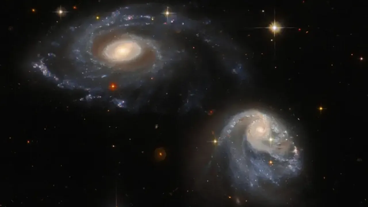 NASA's Hubble captures spectacular pair of interacting galaxies