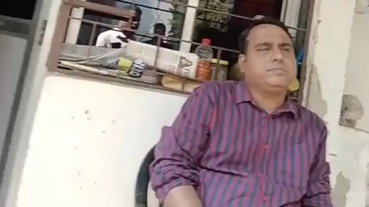 Screen Grab Of Police IIC Dinakrushna Mishra's Viral Video