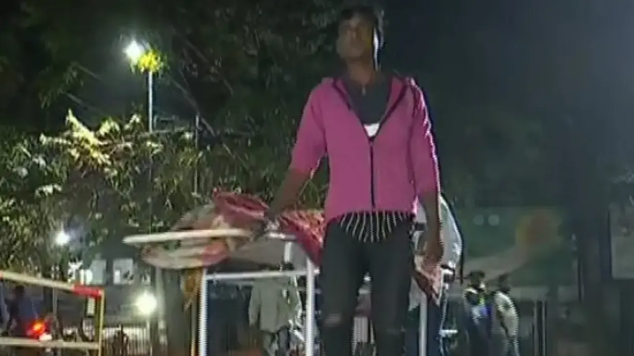 Son carrying body of mother