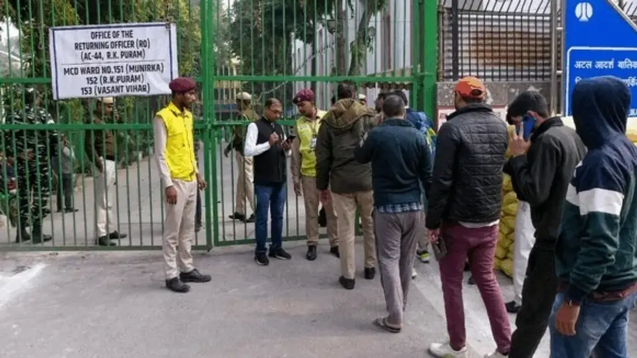 Voters line up outside polling booth
