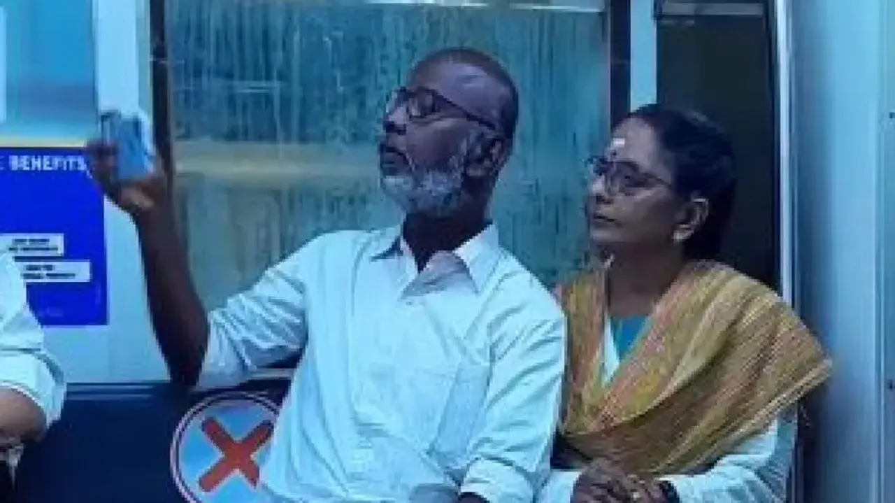 Elderly couple struggles to take selfie in running metro, wins hearts of netizens; watch
