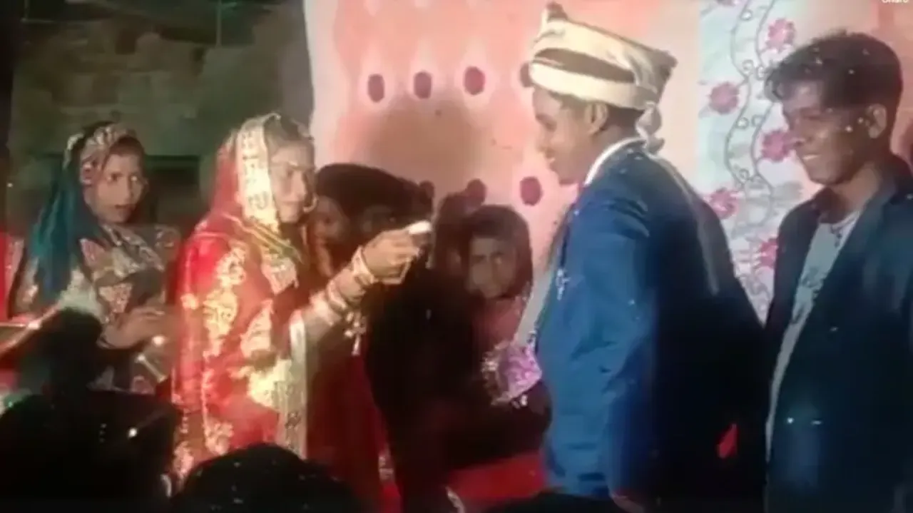 Angry bride and groom throw sweets at crowd