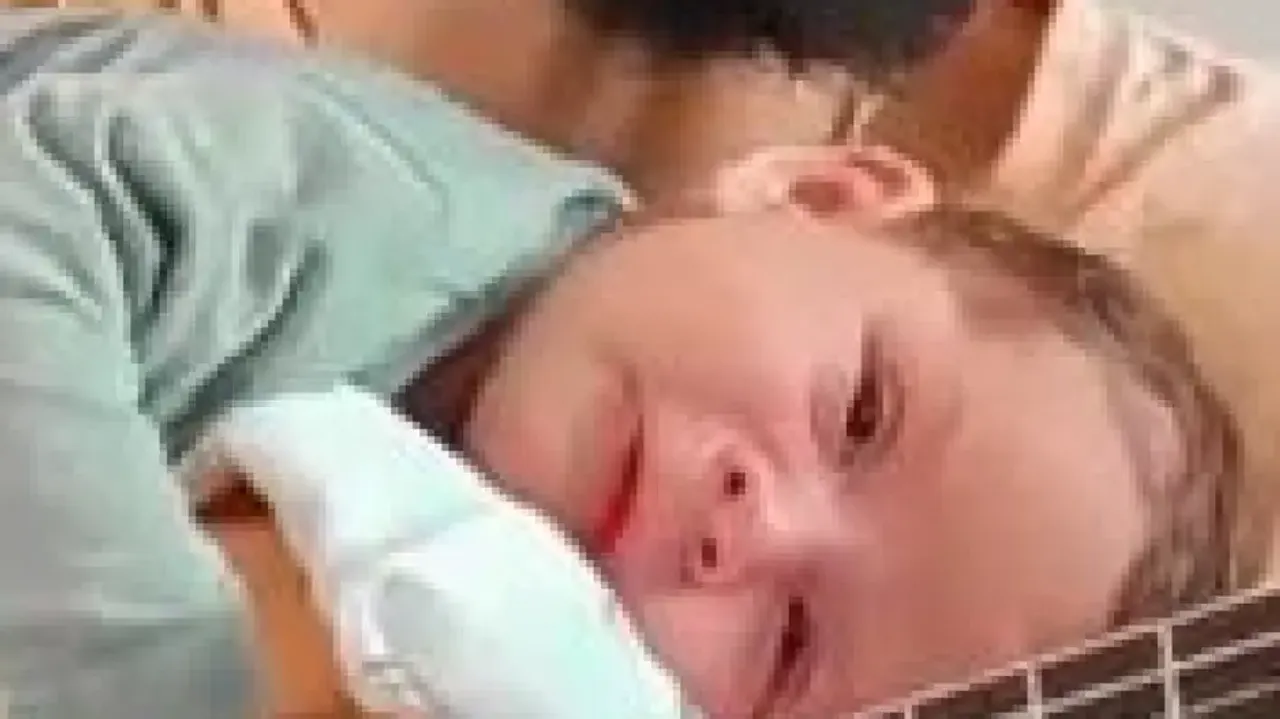 Watch: Baby’s priceless reaction as father sings lullaby 