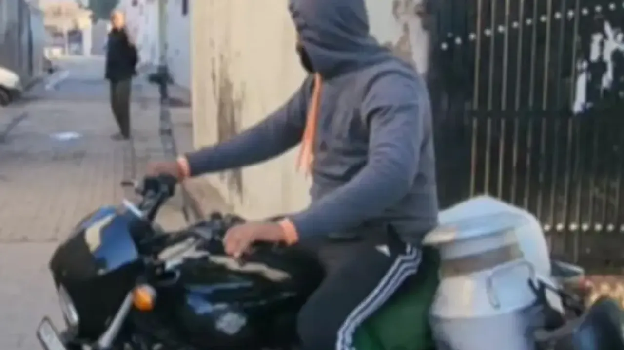 Milkman Riding Harley Davidson