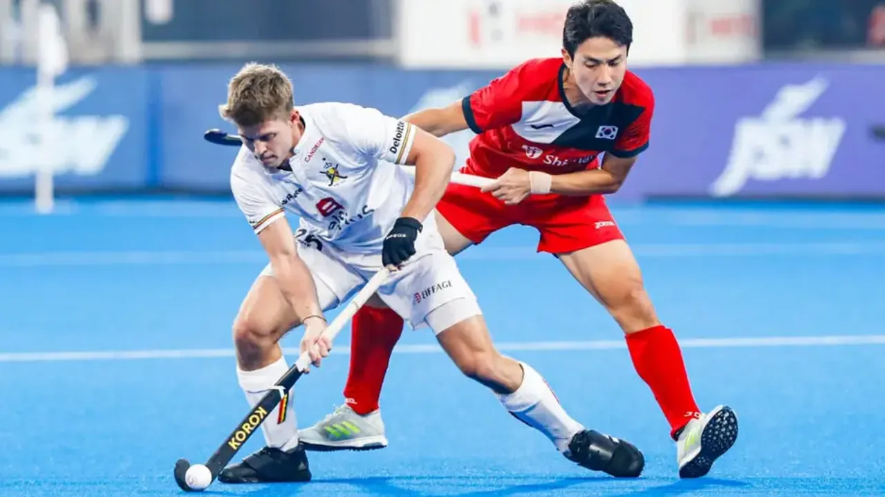 Action during the match between Belgium and Korea at Kalinga Stadium in Bhubaneswar