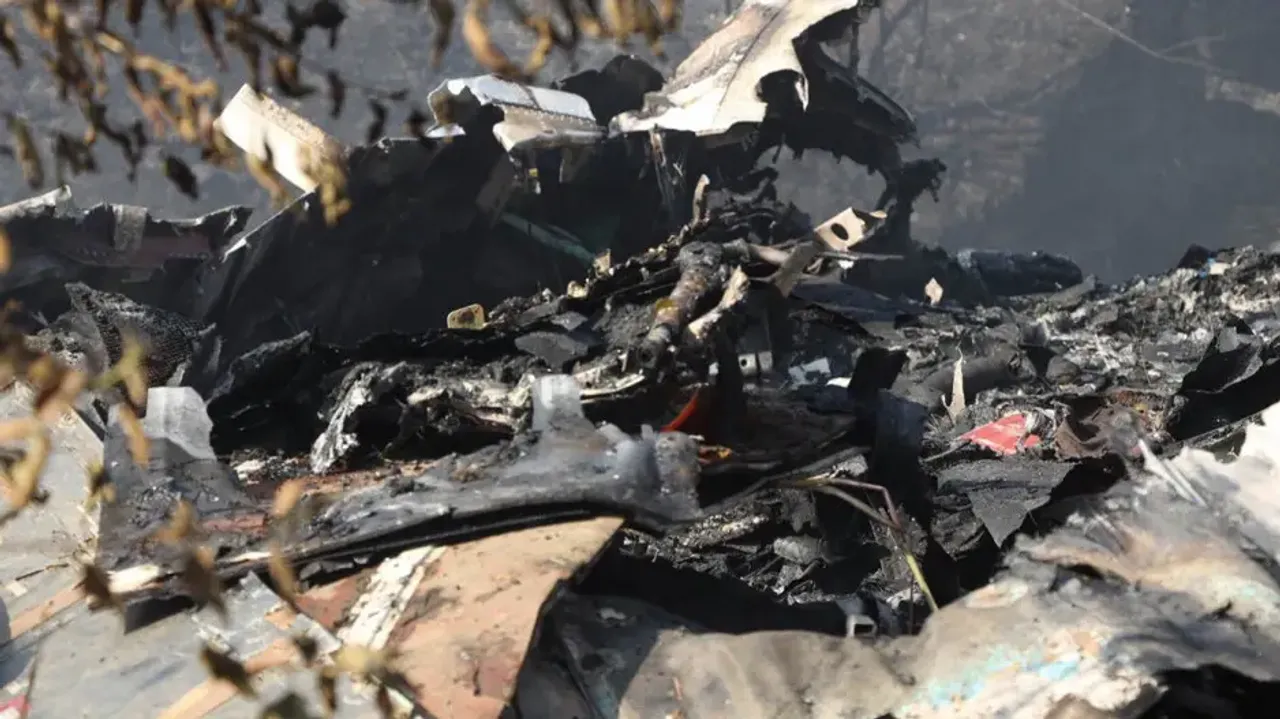 The wreckage of an aeroplane that crashed in Pokhara, Nepal.