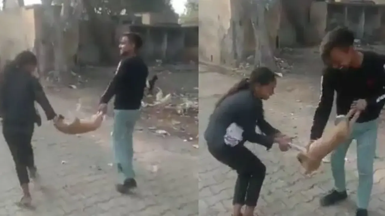 Internet fumes as couple tortures puppy, swing it in the air like toy 