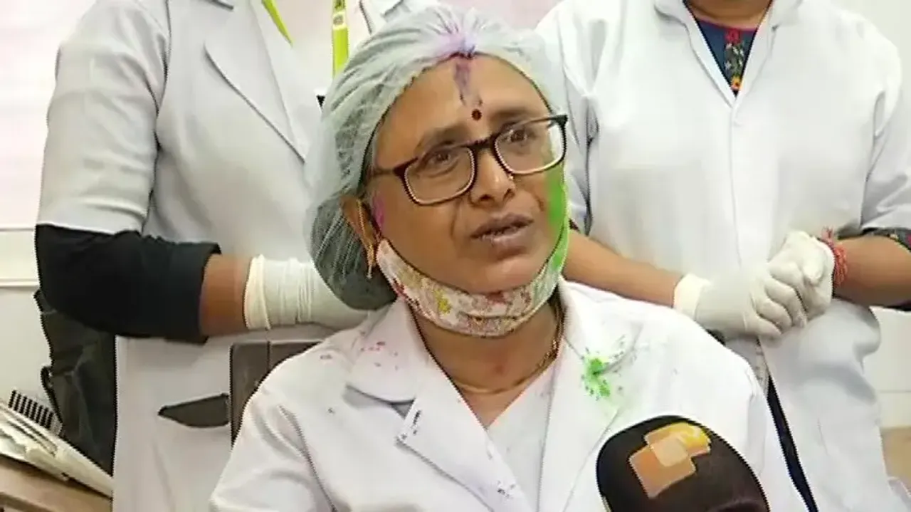 A Nurse At Work On Holi