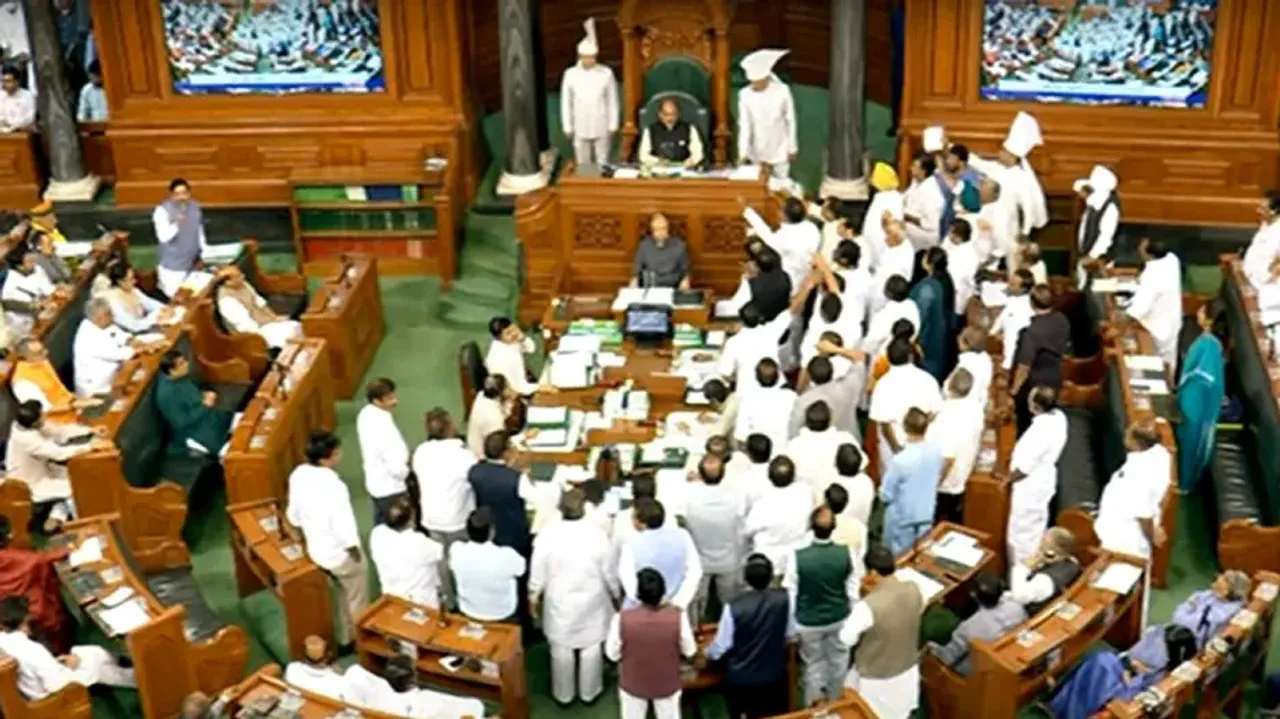 Parliament adjourned till Tuesday amid protests over Rahul's remarks, Adani row
