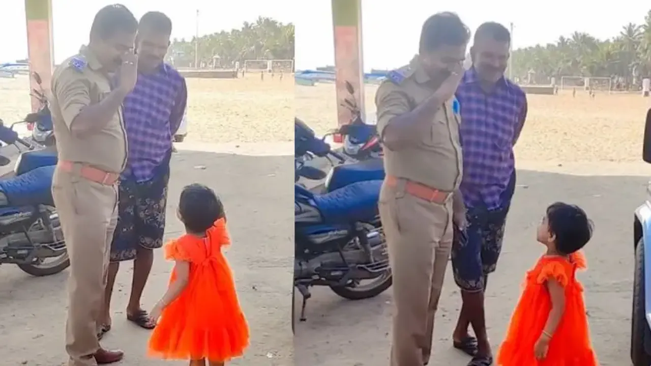 Little girl salutes policeman, cop salutes back; adorable viral video will melt your heart