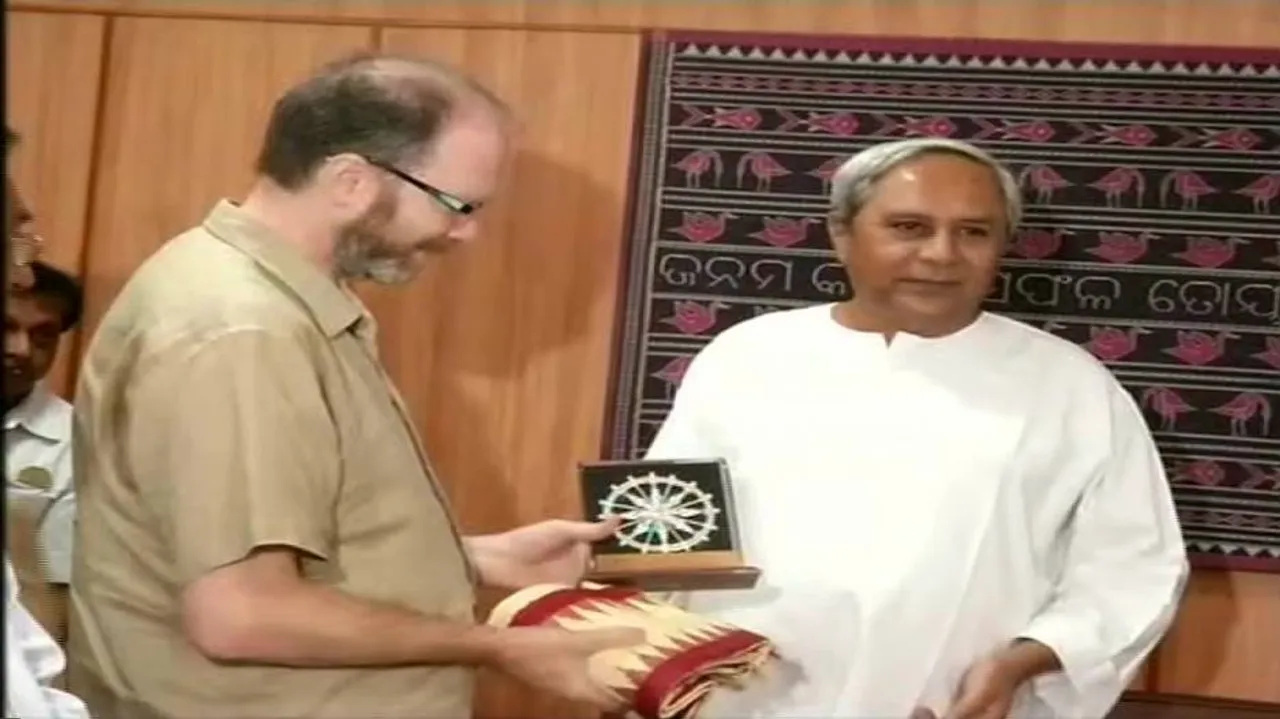 CM Naveen felicitates Prof Diego Andres Golombek