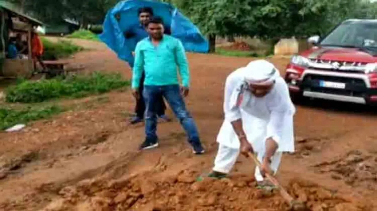 Odisha MLA turns good Samaritan, mends road with a shovel