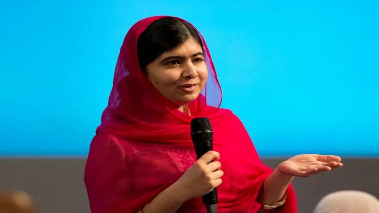 Malala makes tearful return to Pakistan