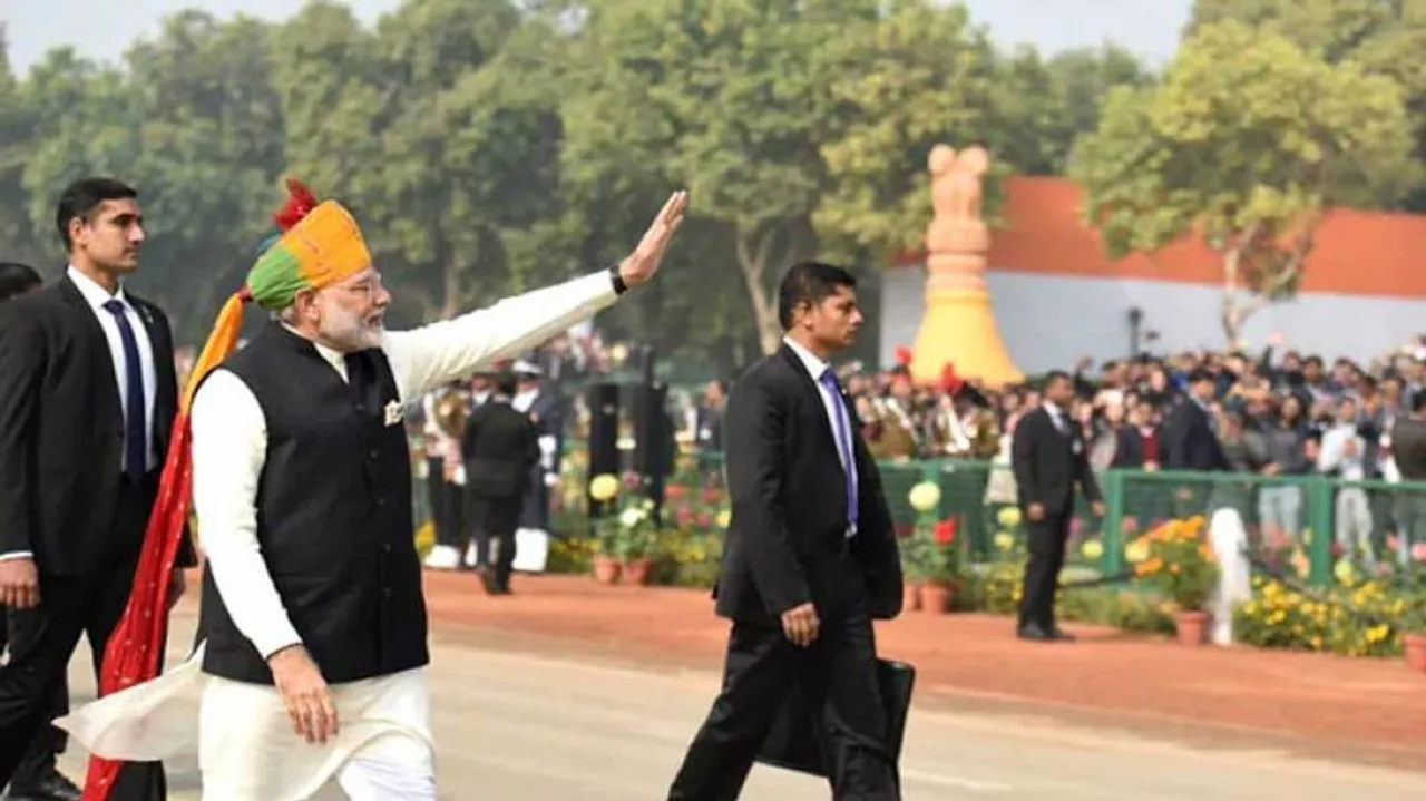 Breaking protocol again, PM Modi walks on Rajpath