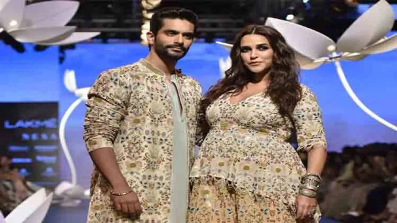 Neha Dhupia debuts baby bump on LFW runway