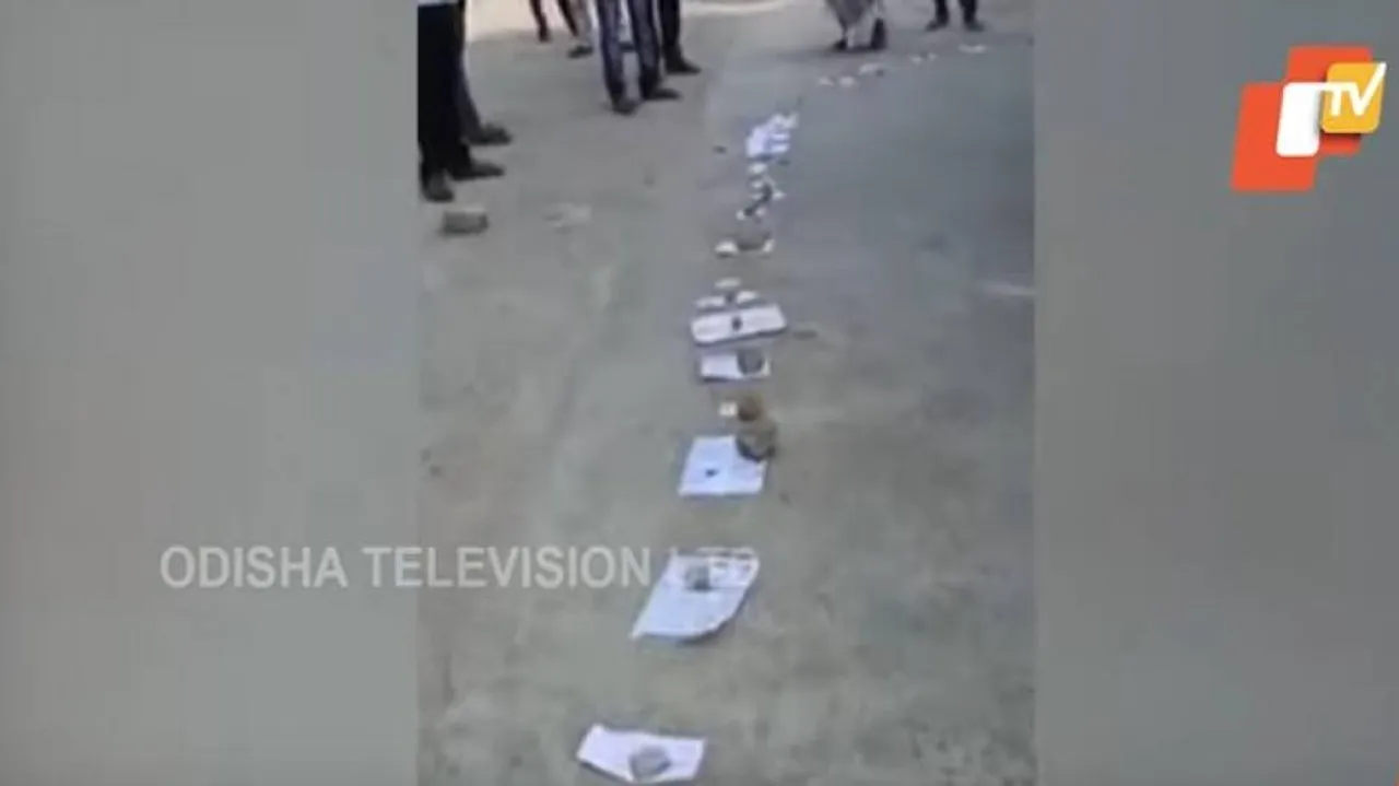 People Put Aadhaar Cards In Long Queue For COVID-19 Test In Odisha