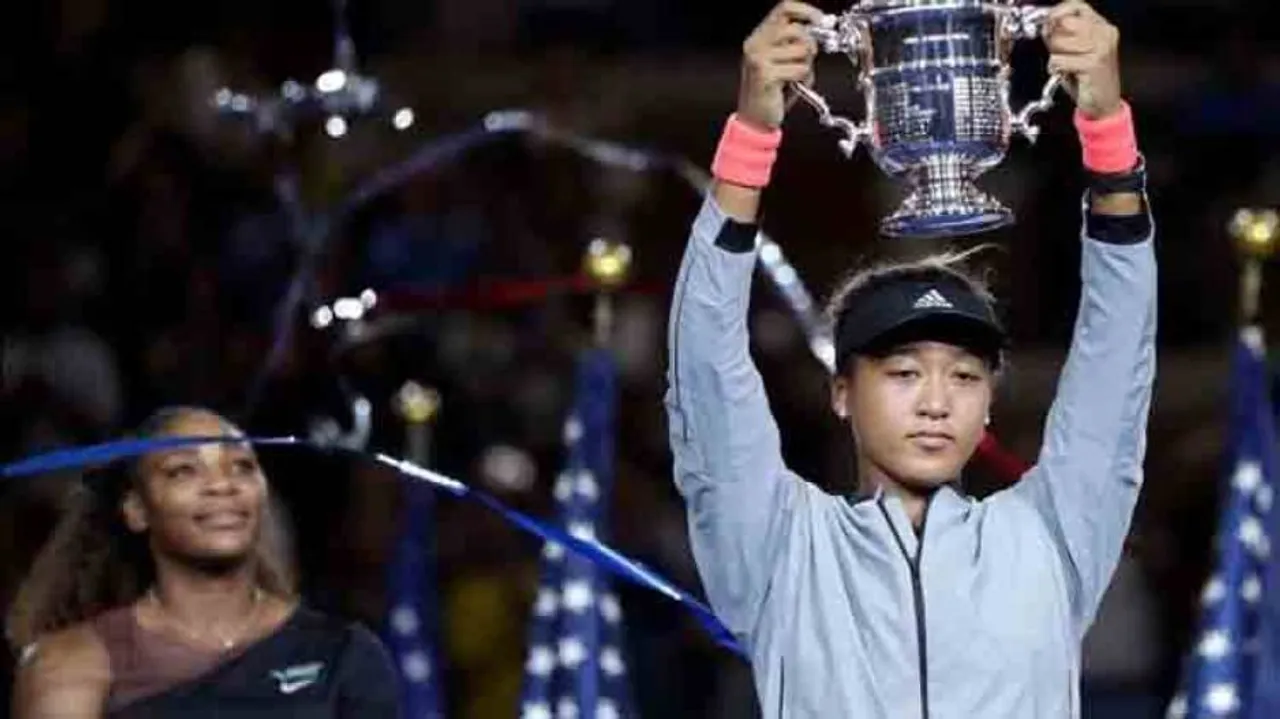 Osaka receives trophy in tears, amid audience boos