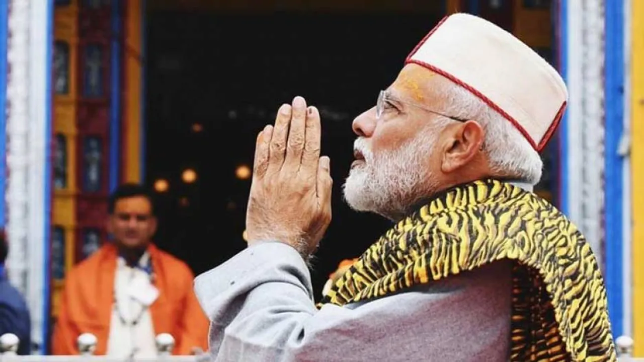 On polling day, Modi prays at Badrinath, Kedarnath
