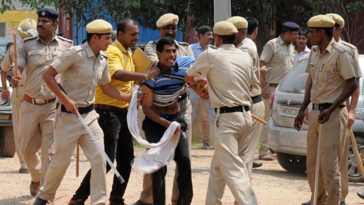 Ryan murder: Police officer suspended for baton-charging journalists