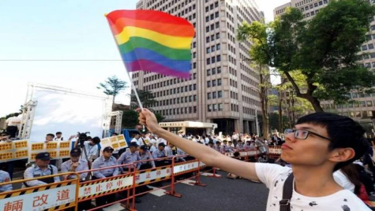 Taiwan approves review of laws to legalise same-sex marriage