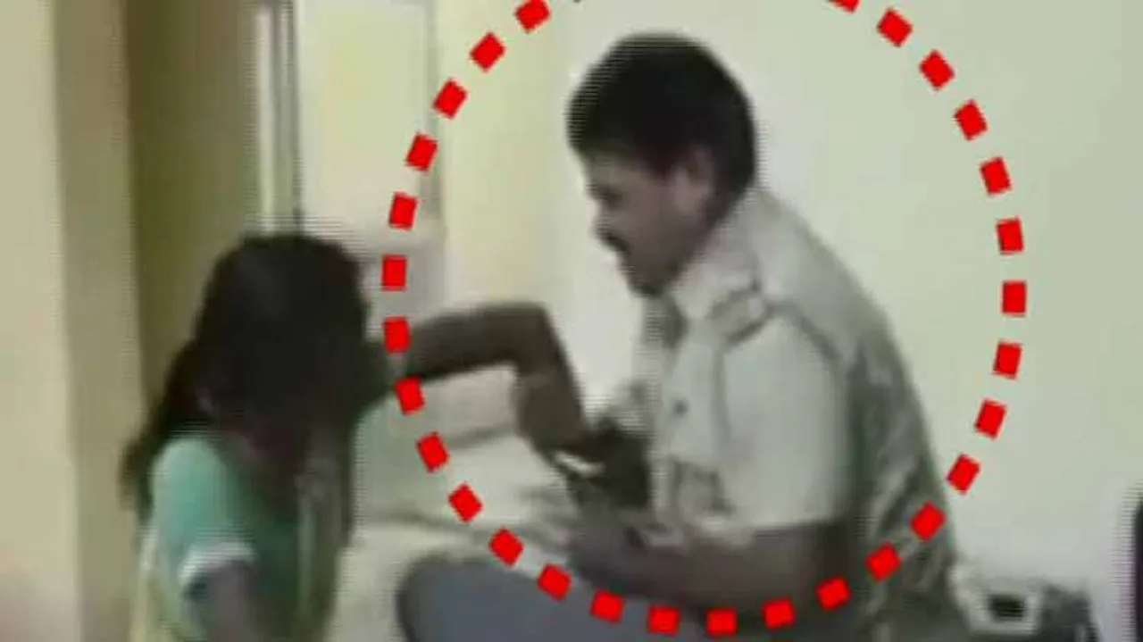 Cop suspended for thrashing woman in police station