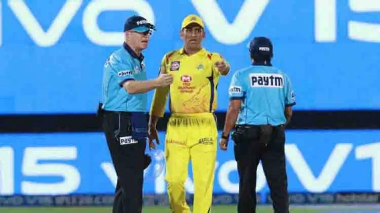 Dhoni fined 50% match fee for confronting umpires