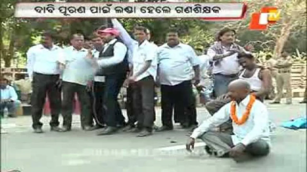 Teachers shave own heads, demand regularisation of jobs