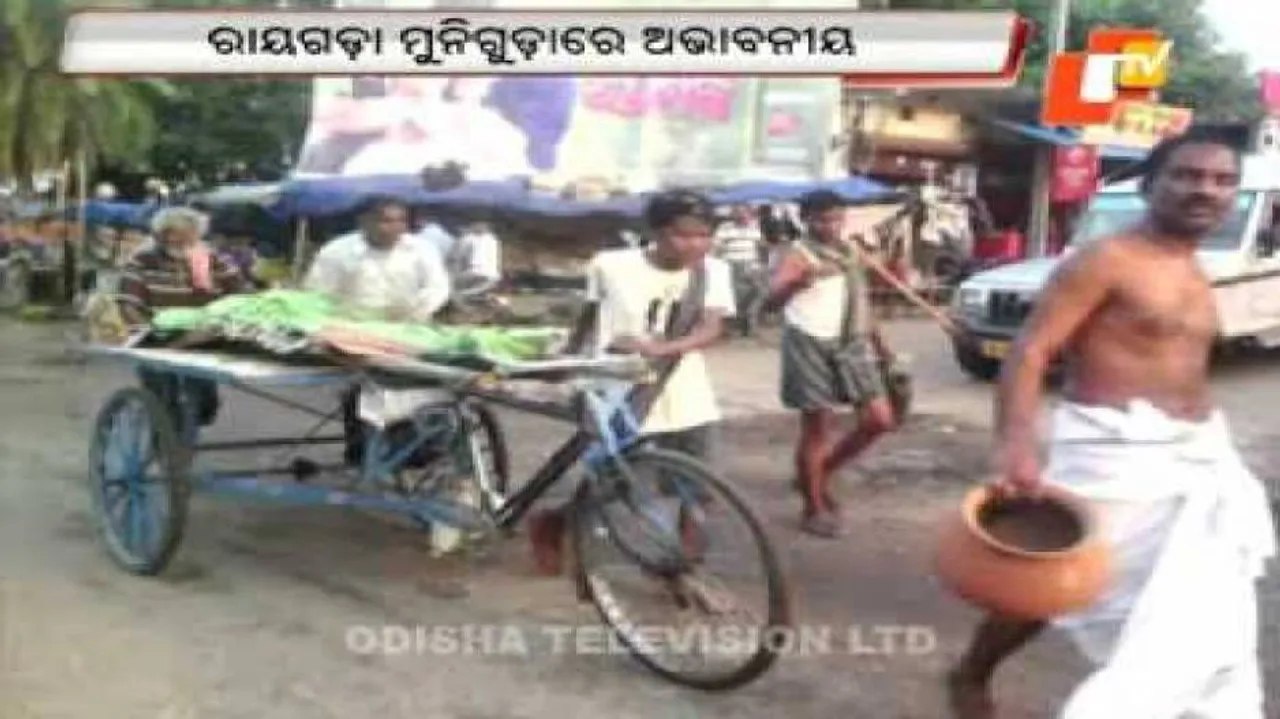 Man carries daughter’s body to cremation ground on trolley
