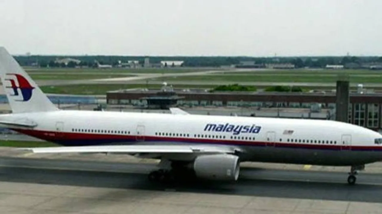 No trace of missing Malaysian plane, stolen passports probed