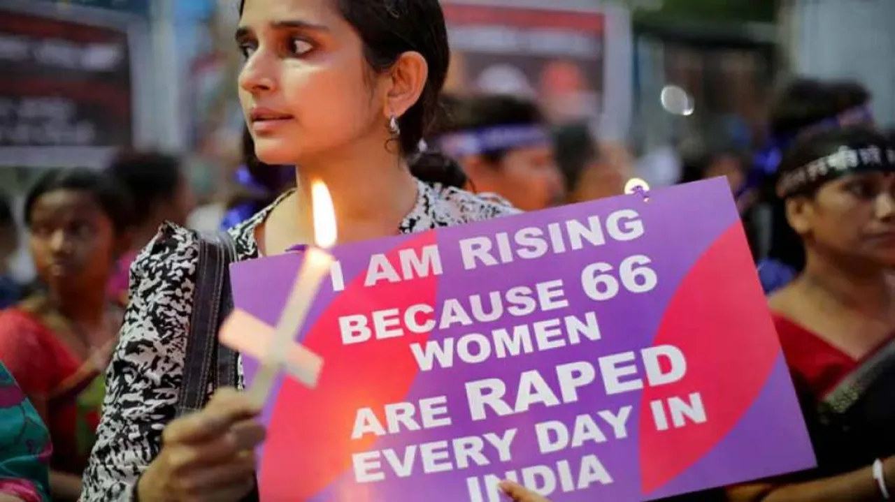 Teenage girl sits on solitary protest outside Parliament over crimes against women