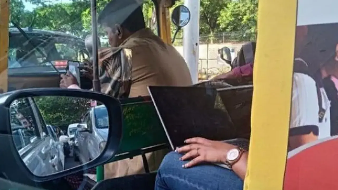Bengaluru: Woman spotted working on laptop while stuck in traffic, pic goes viral