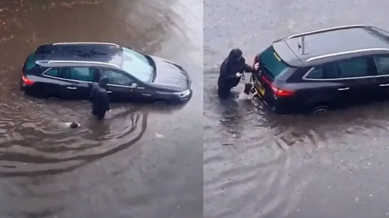 Best friend indeed! Doggy helps man to push car out of waterlogged road; watch