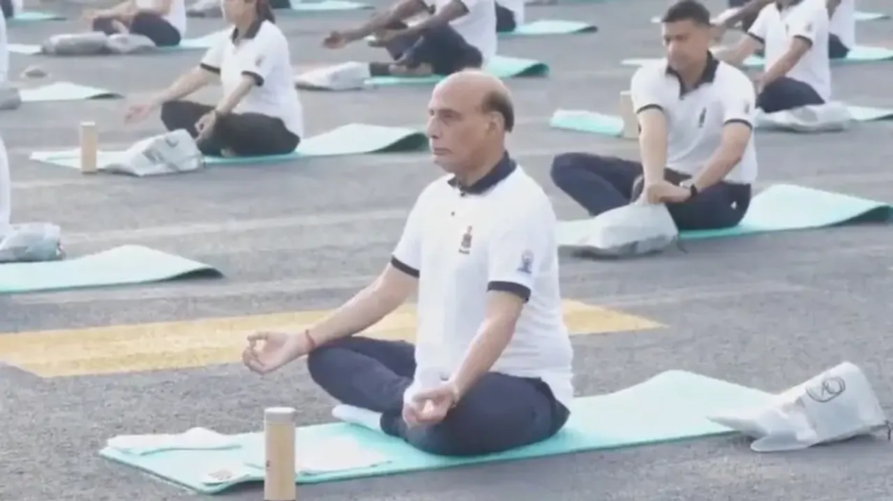 Rajnath Singh doing Yoga onboard INS Vikrant
