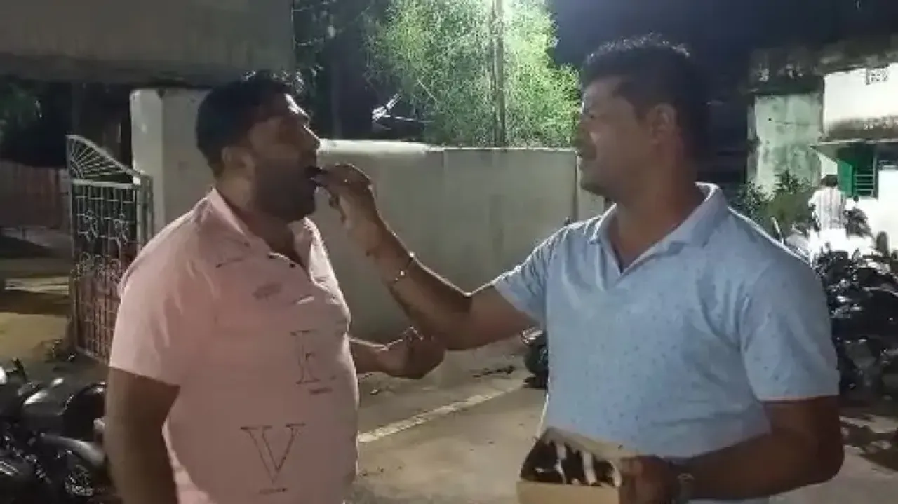 Locals Distribute Sweets After Addl Sub-Collector Falls In Vigilance Net