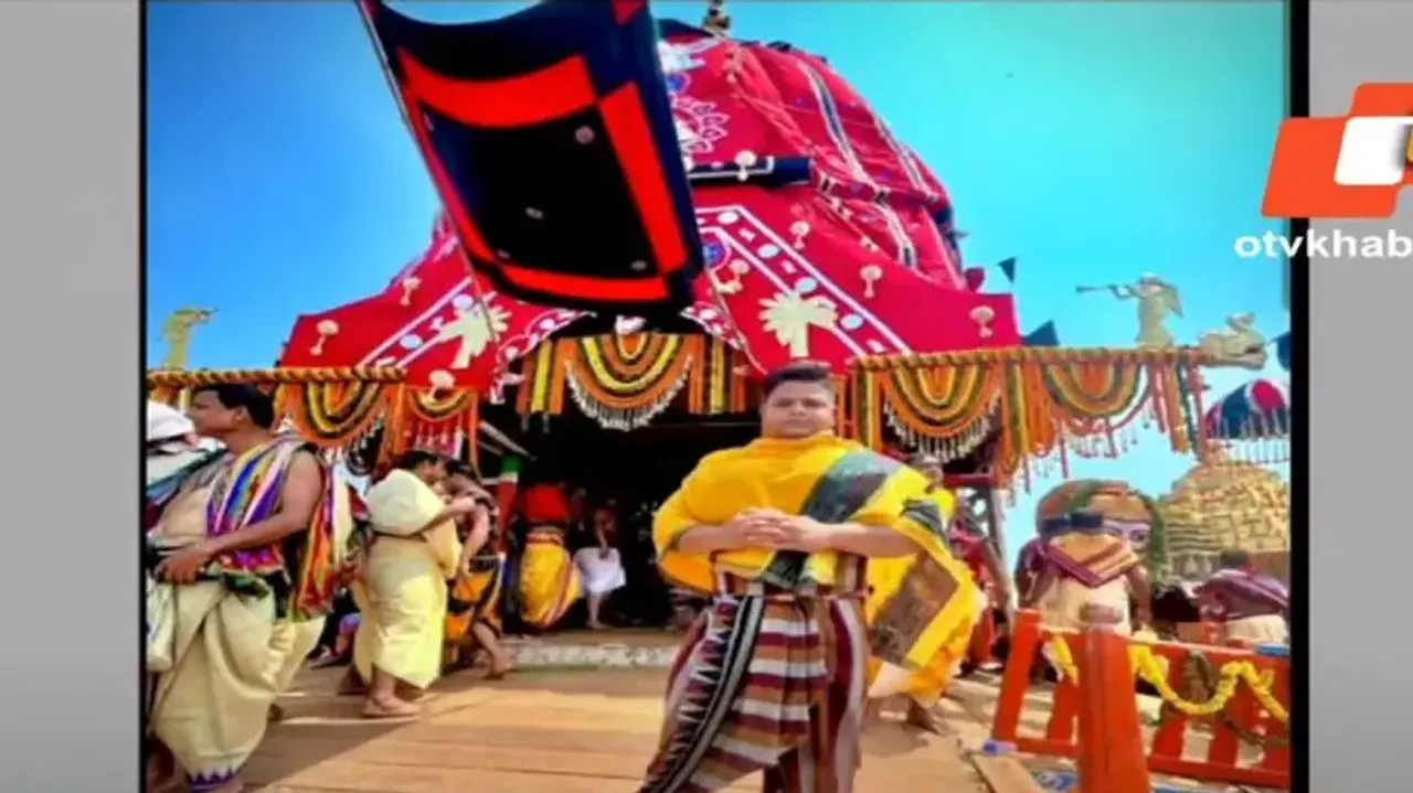 Non-servitors climb atop chariots in Puri during Rath Yatra