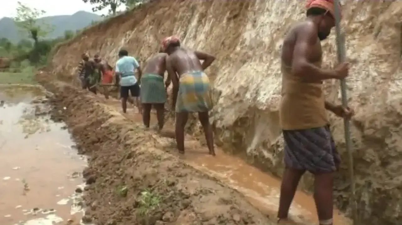Rayagada farmers dig canal through hill