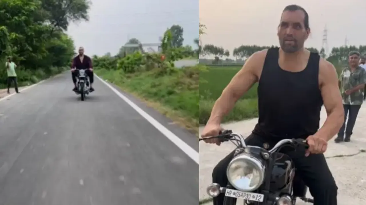 Royal Enfield Bullet looks like a toy in front of the Great Khali