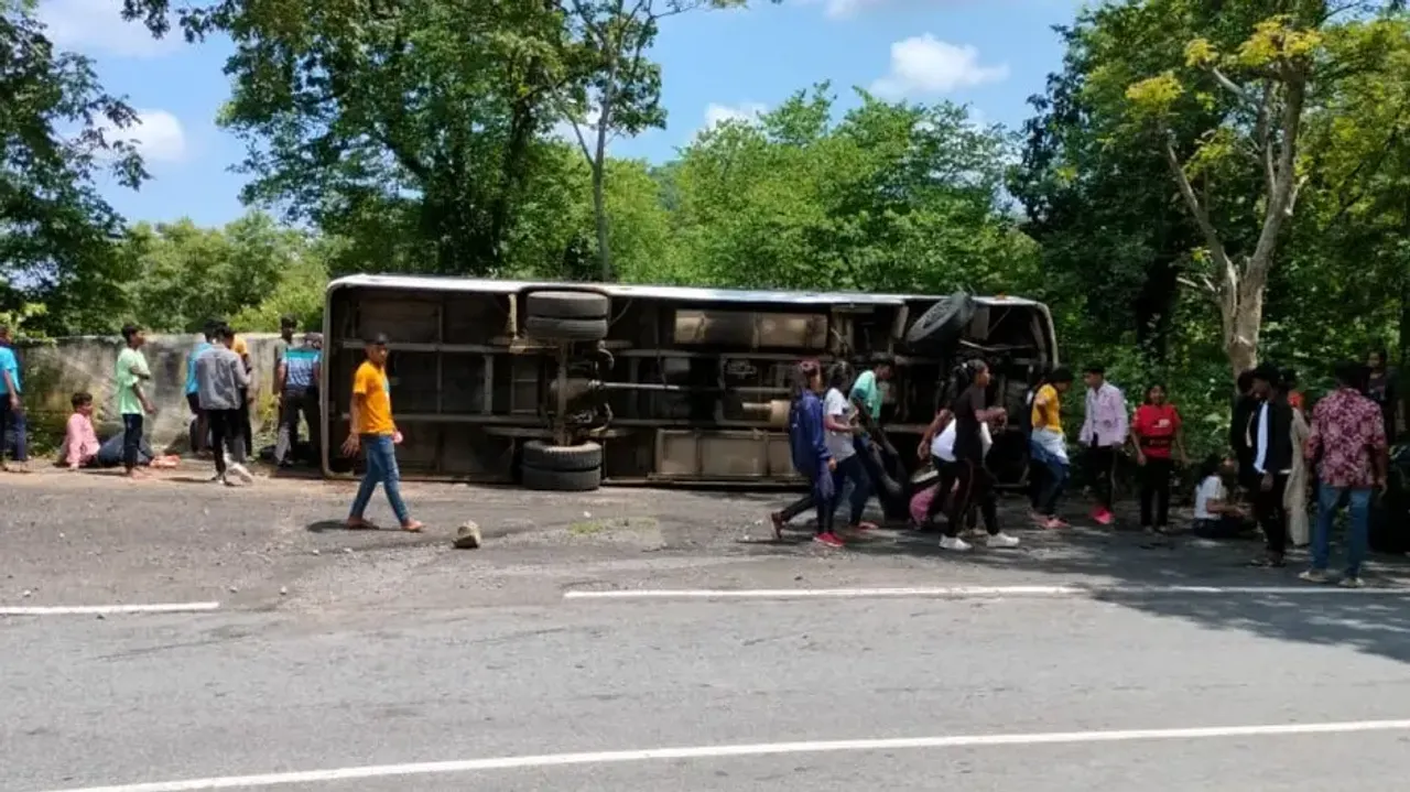 Bus overturns