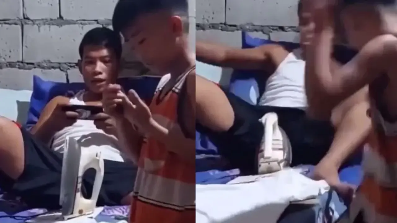 Young boy's hot iron prank on father creates internet storm; Watch