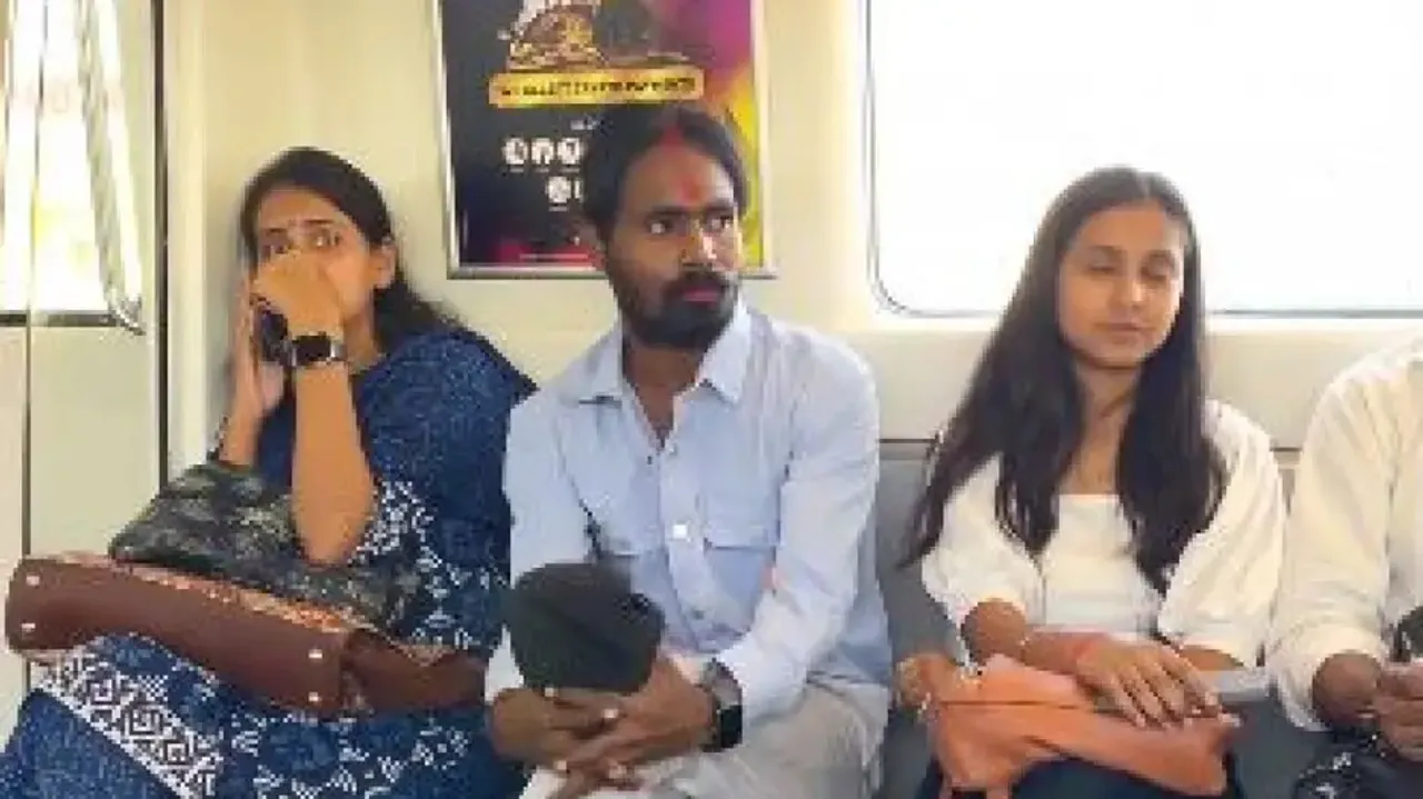 Delhi Metro: Man travels with sindoor, lipstick & bindi in viral video, passengers shocked